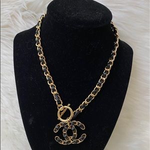 Gold tone with black necklace